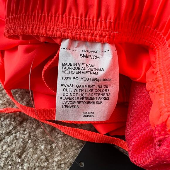 NWT Under Armour Men's Neon Orange Loose Fit Woven Graphic Shorts Small - Picture 14 of 14